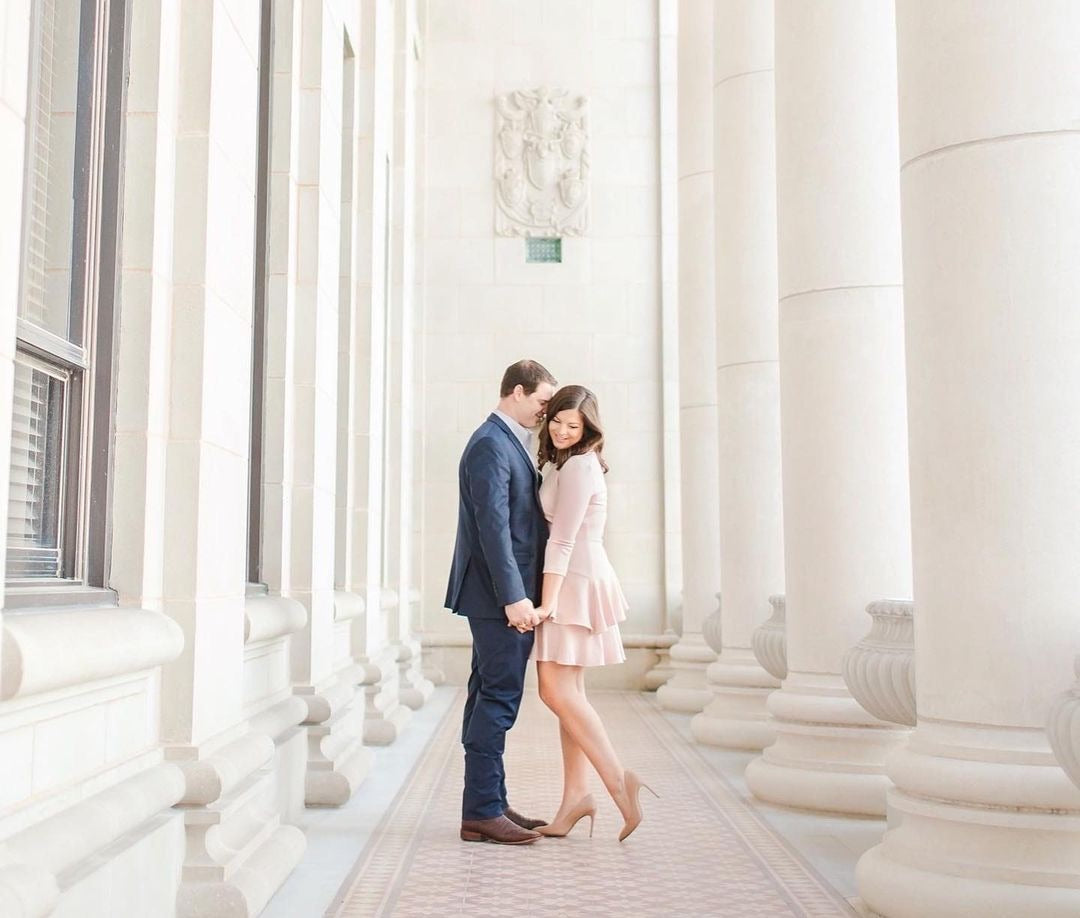 An engaged couple in a soft editorial portrait